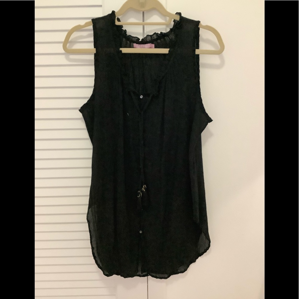 Calypso silk sleeveless shirt with ruffle collar & tassel front